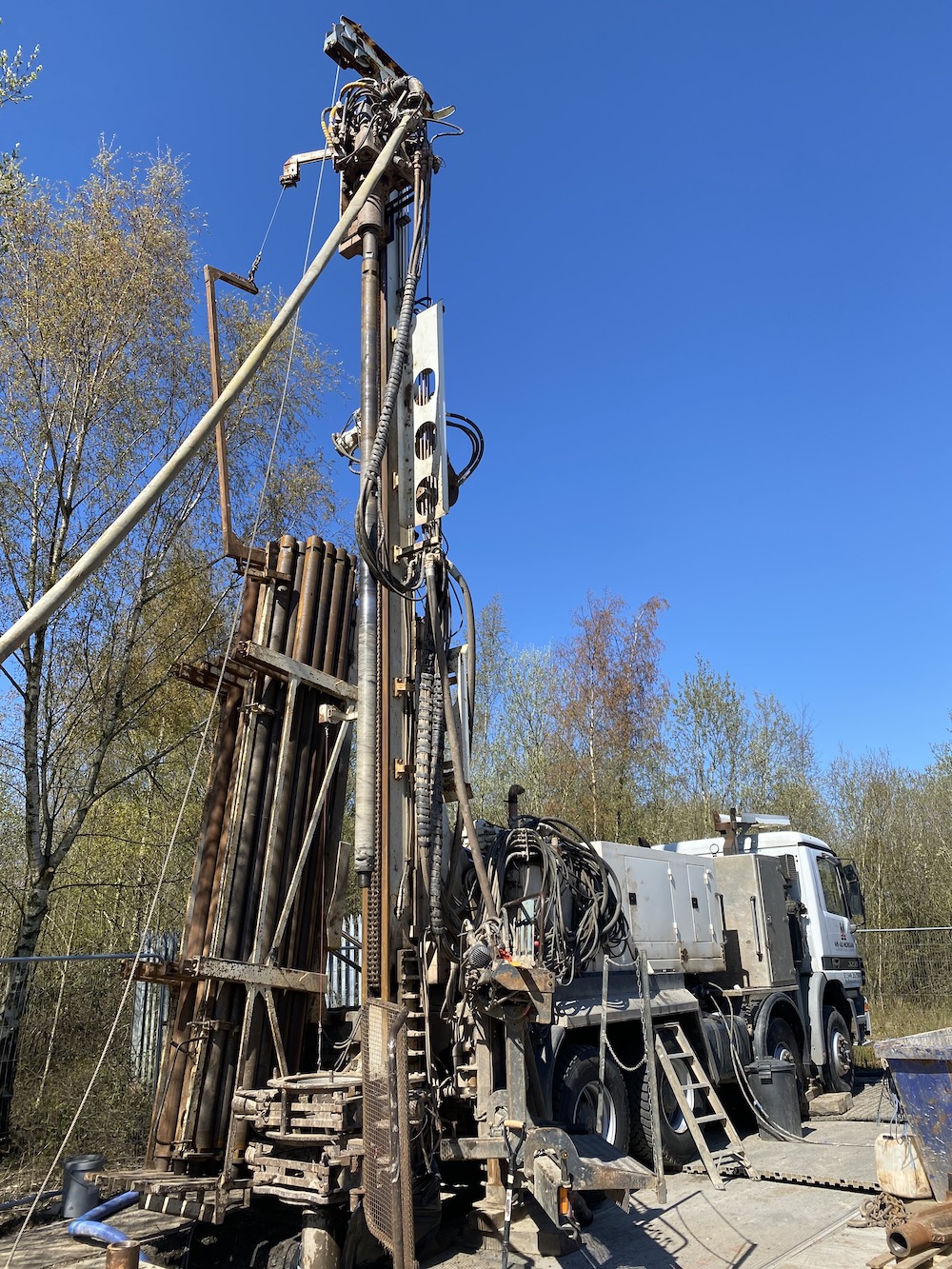 Drilling monitoring wells into abandoned mine workings