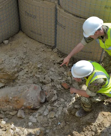 igne managing an unexploded bomb on a building site